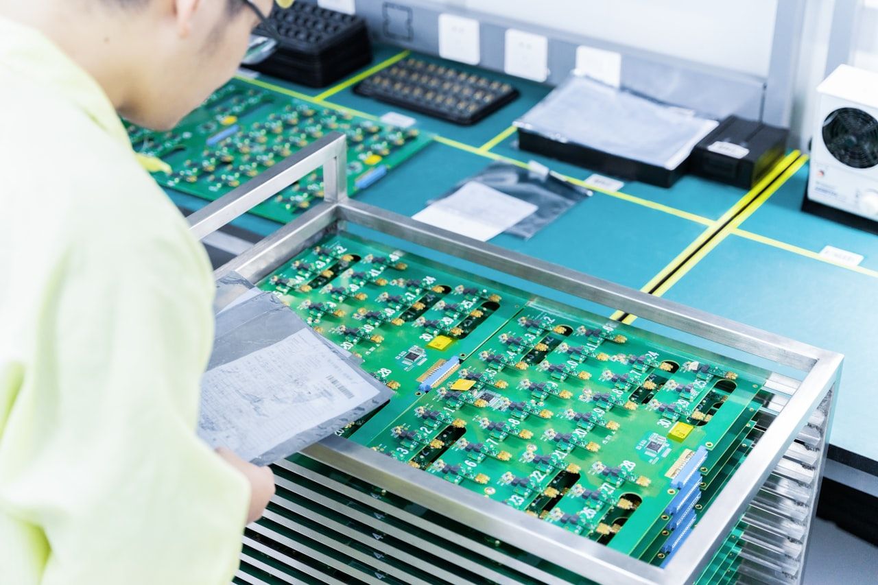 Ceynetics engineers working on electronic assemblies
